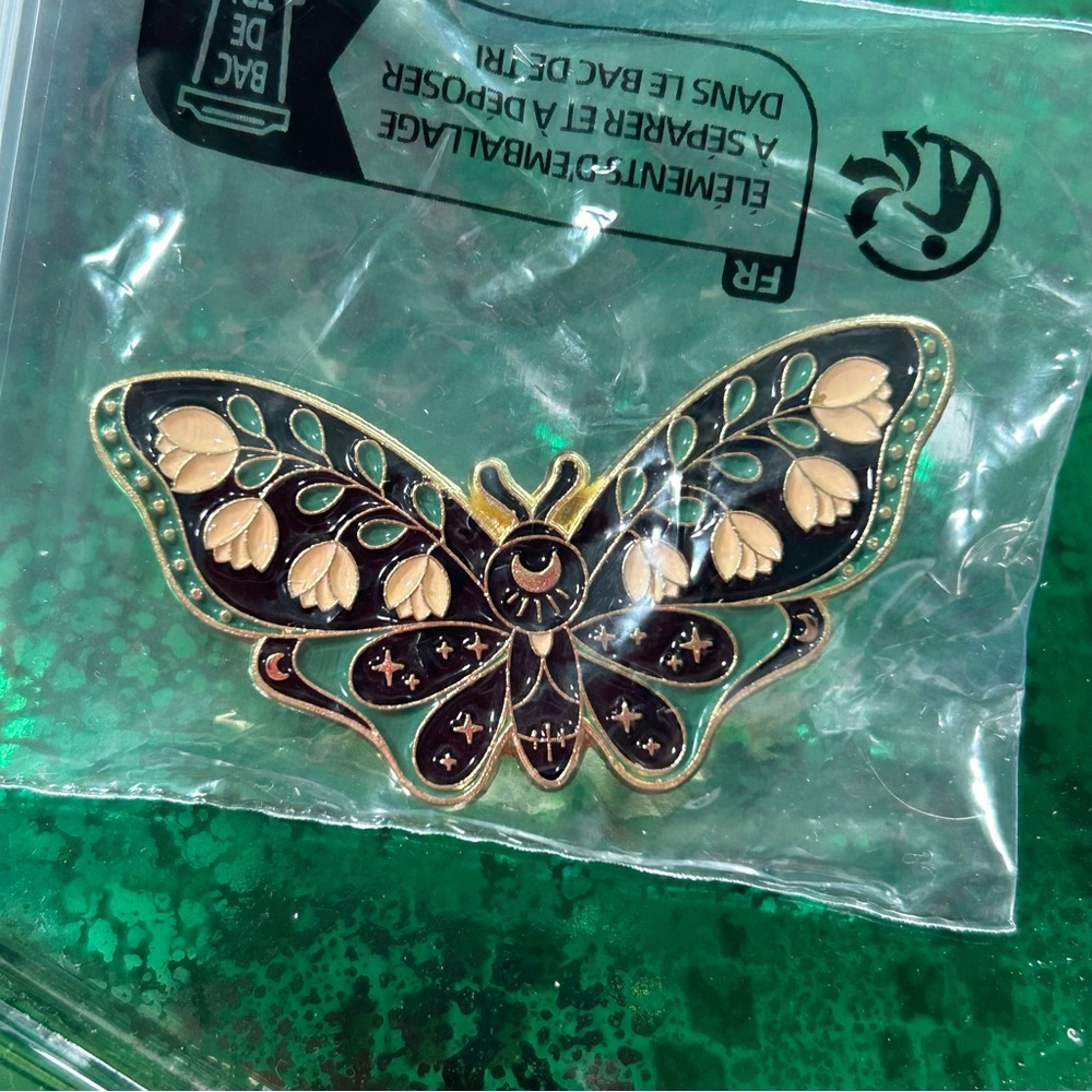 Flower moth pin